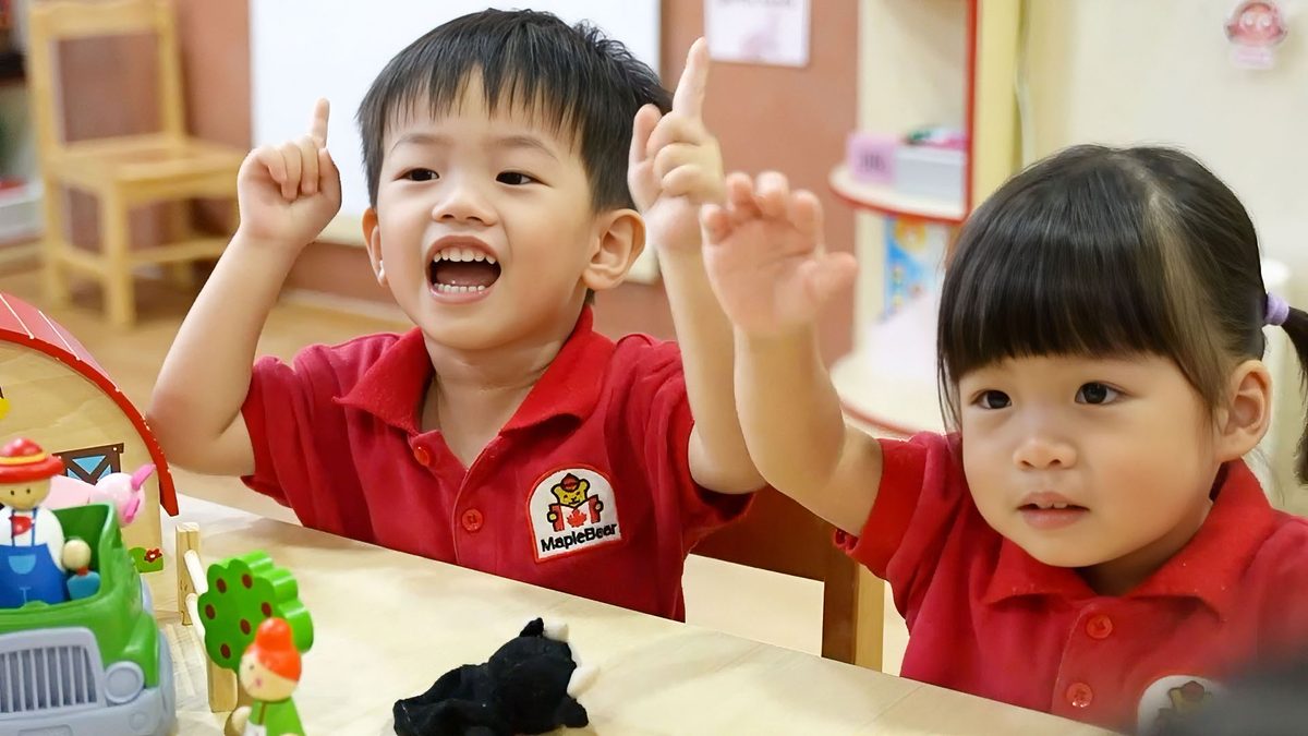 Happy children at a MapleBear Jurong Gateway family event